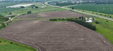 Aerial view of a brown farm field